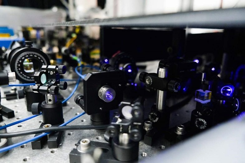 WIS - Optical elements required to create laser pulses that can control trapped ions Photo - Freddy Pizanti